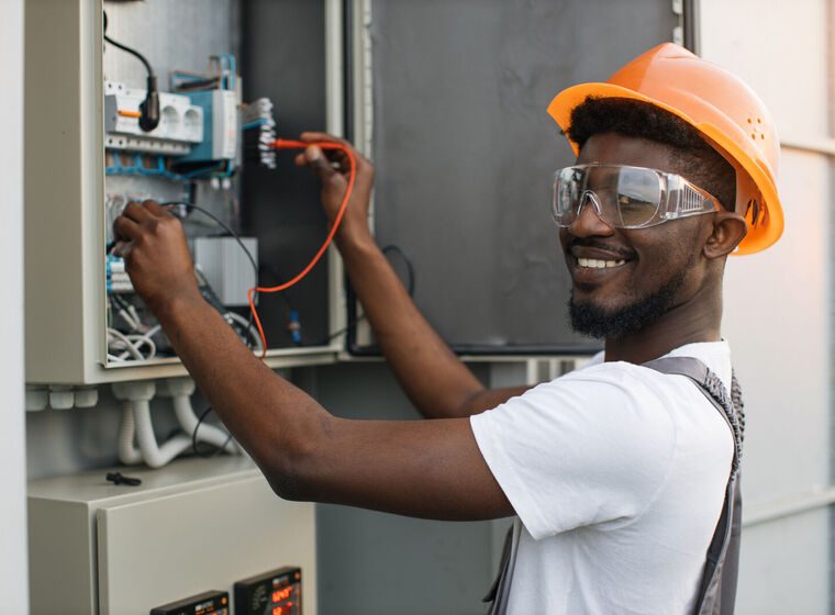 Industrial electrician servicing a power transformer in Gauteng