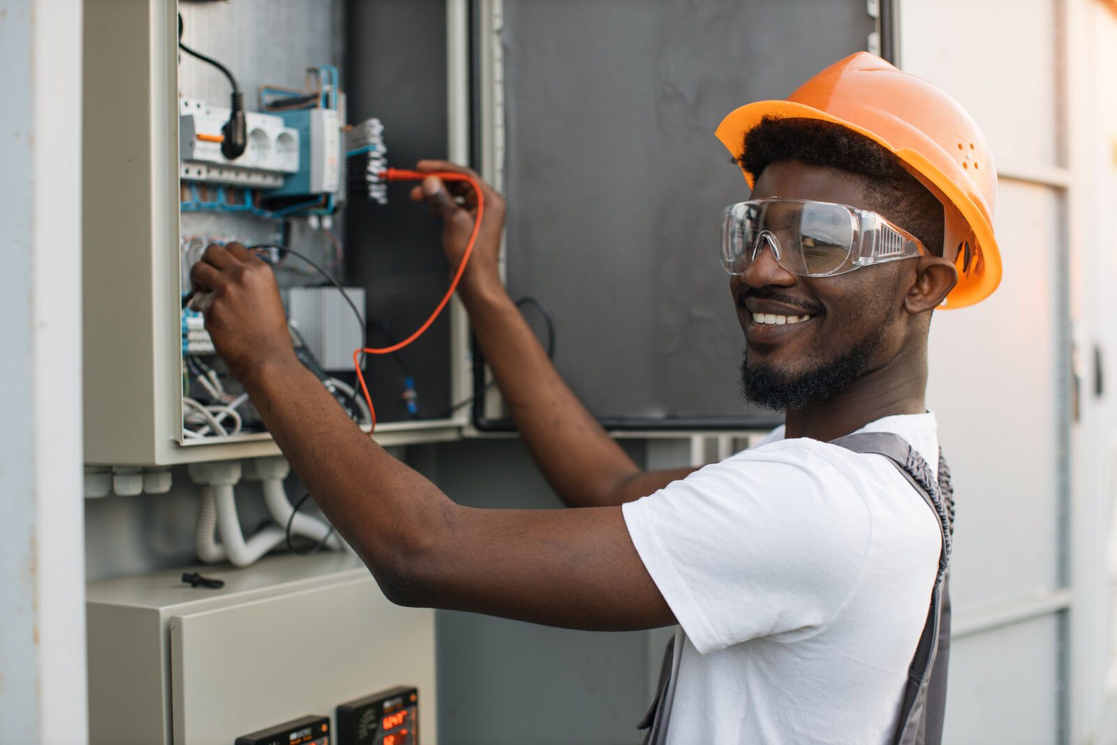 Industrial electrician inspecting transformer and switchgear at a Gauteng plant